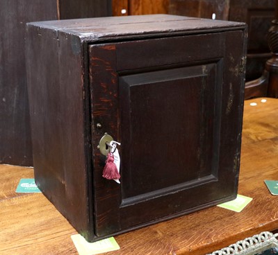 Lot 1460 - An 18th Century Oak Spice Cupboard and Key,...