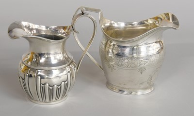 Lot 286 - A George III Silver Cream-Jug, engraved with...