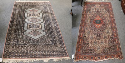 Lot 1173 - Senneh Rug, the ivory Herati field with an...