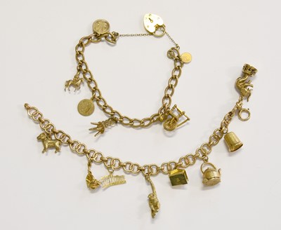 Lot 228 - A 9 Carat Gold Fancy Link Bracelet, suspending...