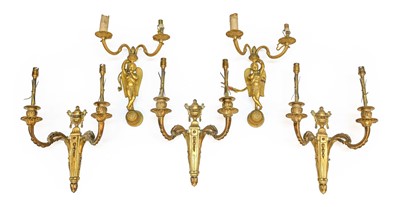 Lot 626 - A Pair of French Gilt Metal Twin-Light Wall...