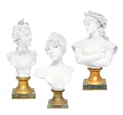 Lot 585 - A Matched Set of Three Bisque Porcelain Busts...