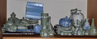Lot 151 - A shelf of Wedgwood sage green and white jasperware including a three colour urn (a.f.),...