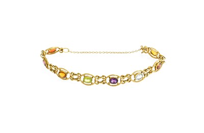 Lot 22 - A 9 Carat Gold Multi-Gem Set Bracelet, the...