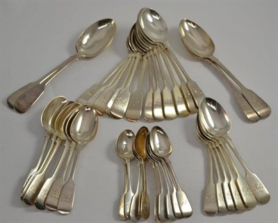 Lot 173 - Twelve fiddle pattern silver soup spoons, four tablespoons, twelve dessert spoons and ten teaspoons