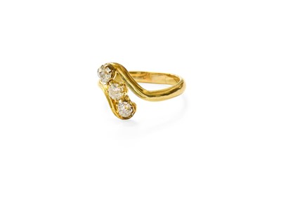 Lot 450 - A Diamond Three Stone Twist Ring, the old cut...