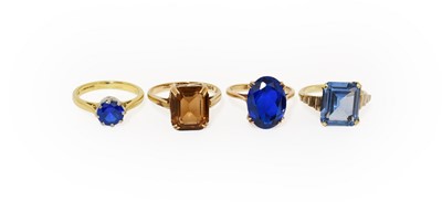 Lot 264 - An 18 Carat Gold Synthetic Blue Spinel Ring,...