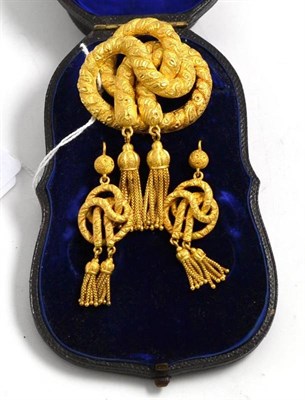 Lot 182 - A Victorian knot brooch and earrings, with tassels