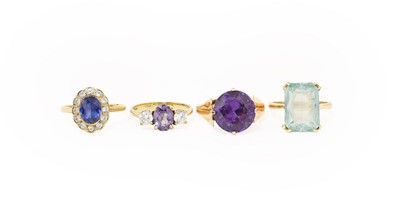 Lot 228 - A 9 Carat Gold Synthetic Green Spinel Ring,...