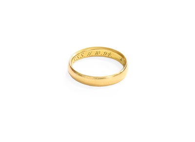 Lot 185 - An 18 Carat Gold Band Ring, finger size P