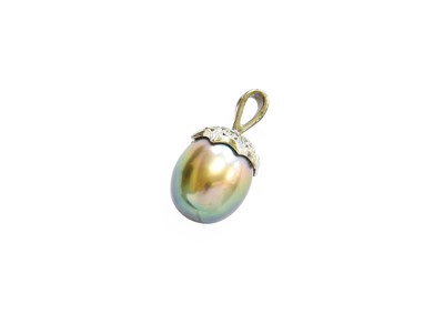 Lot 288 - A Cultured Pearl and Diamond Pendant, the oval...