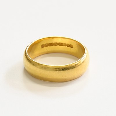 Lot 225 - A 22 Carat Gold Band Ring, finger size N