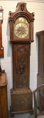 Lot 1407 - A Carved Oak Eight Day Longcase Clock, 12"...