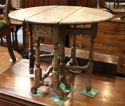 Lot 1466 - A Small Oak Drop Leaf Table, on spindle turned...