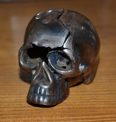 Lot 210 - A 19th century alloy skull (a.f.)