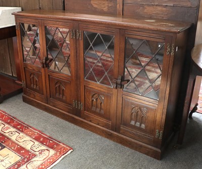 Lot 1520 - A Titchmarsh & Goodwin Style Oak Bookcase...