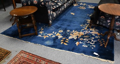 Lot 1086 - Chinese Carpet, the indigo field decorated...