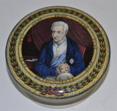 Lot 221 - A Prattware pot lid of Wellington with base, 13cm diameter