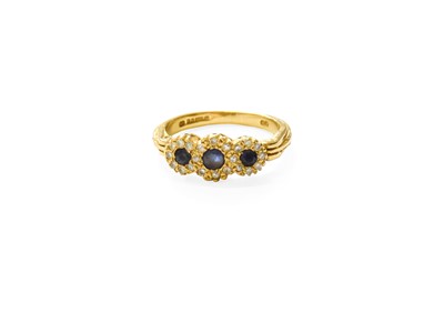 Lot 460 - An 18 Carat Gold Sapphire and Diamond Triple...