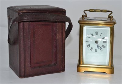 Lot 236 - A French brass carriage timepiece, 14cm high, in Morocco leather case