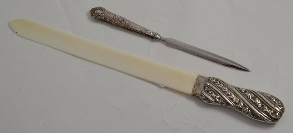 Lot 237 - Silver mounted ivory letter opener and a