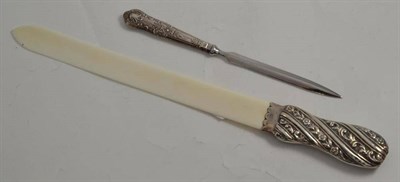 Lot 237 - Silver mounted ivory letter opener and a modern silver letter opener