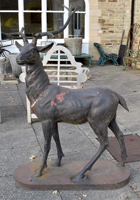 Lot 1273 - A Large Weathered Cast Iron Model of a Stag,...