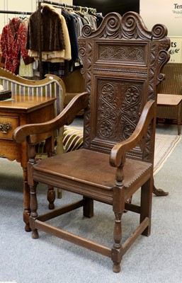 Lot 1420 - A 19th Century Carved Oak Wainscot Chair