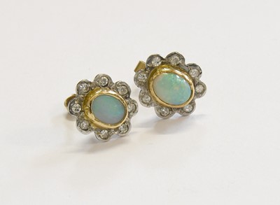 Lot 240 - A Pair of Opal and Diamond Earrings, the oval...