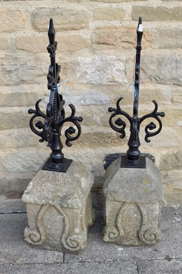 Lot 1277 - A Pair of Carved Sandstone and Black Painted...