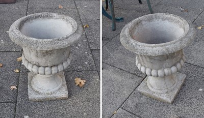 Lot 1270 - A Pair of Composition Garden Urns, with part...