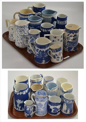 Lot 249 - A collection of twenty five blue and white water jugs (on 2 trays)