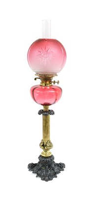 Lot 130 - A Gilt and Patinated Metal and Cranberry Glass...