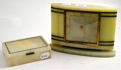 Lot 256 - An Art Deco onyx cigarette box with malachite inlay and a silver hinge; and a similar mantel...