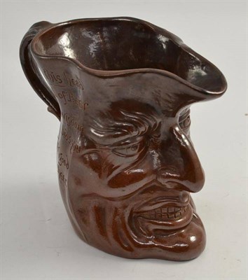 Lot 257 - A late 19th century stoneware jug as a grotesque head, signed to base 'Horrace Elliott, London...