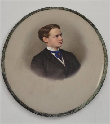 Lot 270 - A 19th century oval printed porcelain plaque of a young gentleman painted in portrait,...