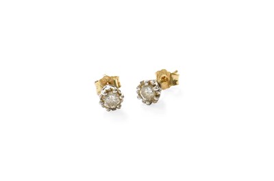 Lot 508 - A Pair of Diamond Solitaire Earrings, the...