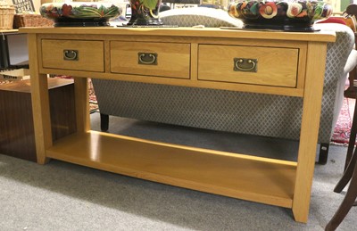 Lot 1326 - A Modern Oak Three Drawer Side Board, 150cm by...