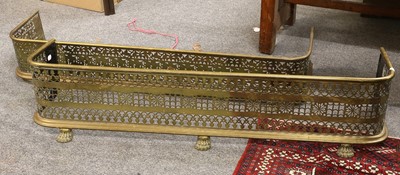 Lot 1335 - A Pierced Brass Fire Curb, with paw feet,...