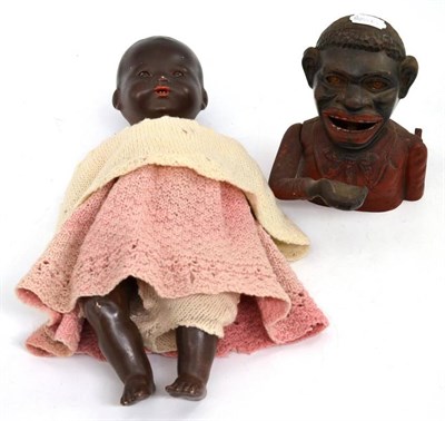 Lot 278 - A 'Jolly Nigger' money bank and an Armand Marseille doll AM351/3 1/2K (a.f.)