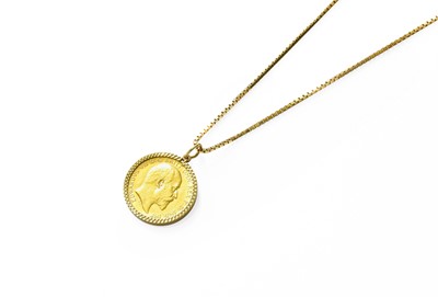 Lot 390 - A Half Sovereign Pendant on Chain, dated 1910...