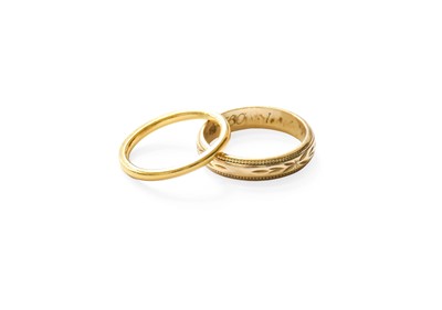 Lot 406 - A 22 Carat Gold Band Ring, finger size G1/2...