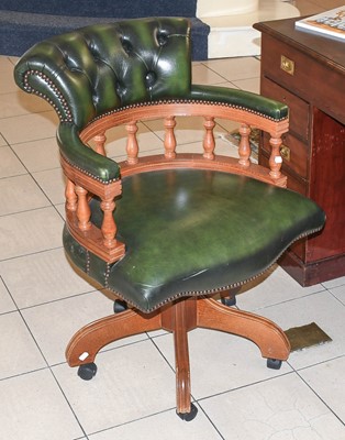 Lot 1404 - A Modern Buttoned Green Leather Revolving Desk...