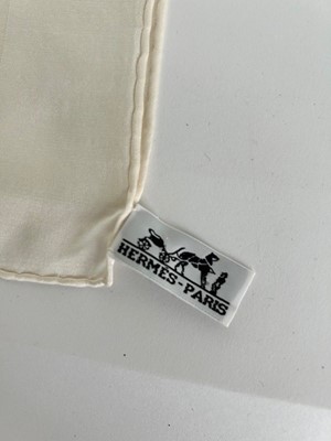 Lot 1072 - Hermès Cream Silk Monogrammed Scarf,...