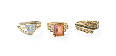 Lot 523 - Three 9 Carat Gold Dress Rings, including...