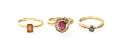 Lot 522 - A 9 Carat Gold Garnet Ring, finger size N; A 9...