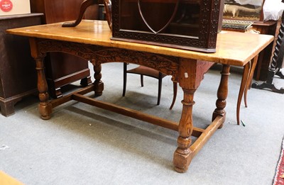 Lot 1452 - An Oak Refectory Dining Table, with acorn and...