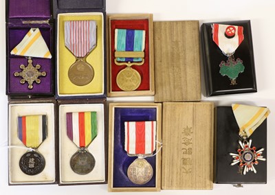 Lot 75 - A Collection of Eight Japanese Medals, all in...