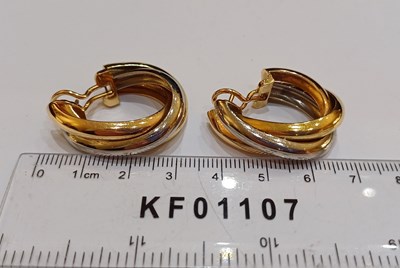 Lot 2251 - A Pair of Tri-Colour Trinity Creole Earrings,...