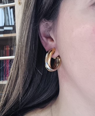Lot 2251 - A Pair of Tri-Colour Trinity Creole Earrings,...